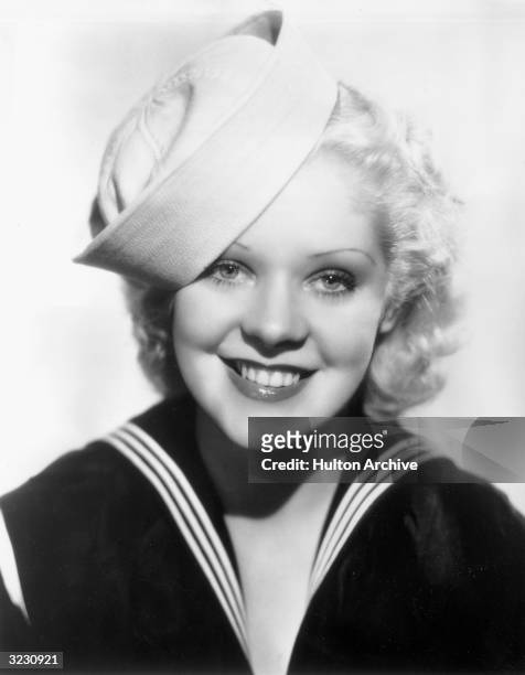 American actor and singer Alice Faye wearing a middy and a sailor's cap.