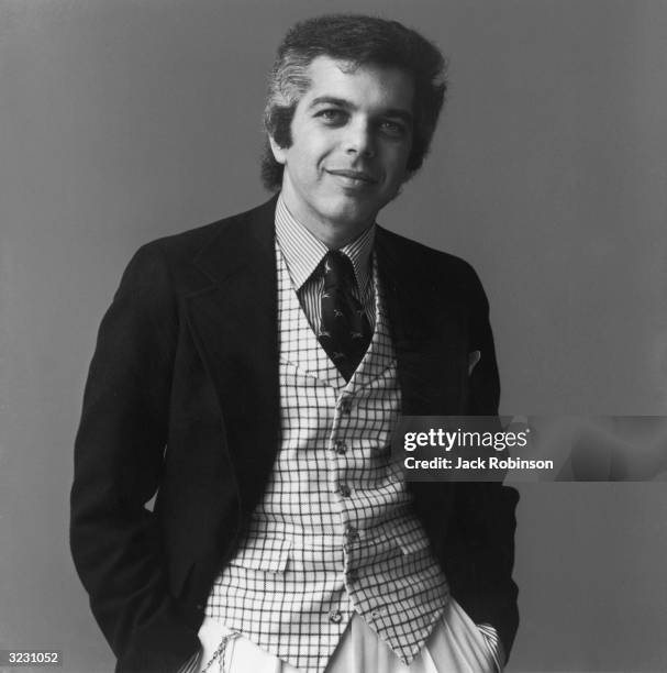 Studio portrait of American fashion designer Ralph Lauren.