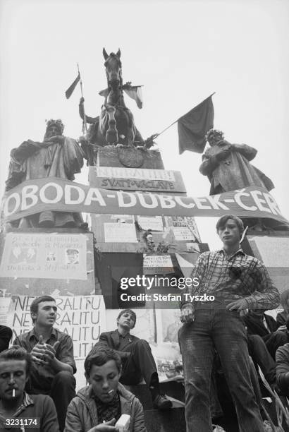 The statue of St. Wenceslas, in the Prague square of the same name, provides a focal point for Czech protests against the Soviet invasion. The banner...