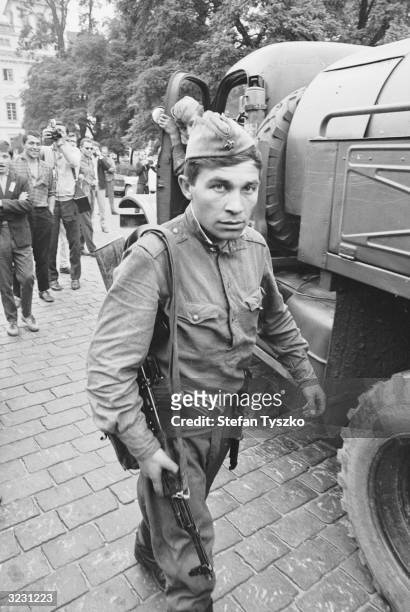 An armed Soviet soldier on the streets of Prague during their occupation of the Czechoslovakian city after Alexander Dubcek's 'Prague Spring' reform...