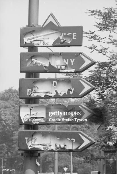 In an attempt to make it as difficult as possible for the invading Soviets to find their way around Prague, the city's road signs are smashed.