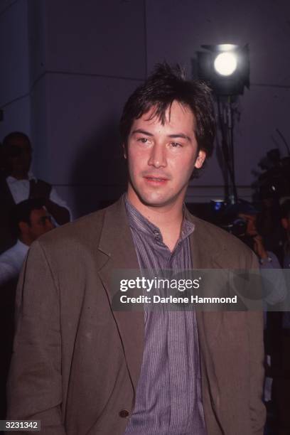 American actor Keanu Reeves attends the premiere of director Alfonso Arau's film, 'A Walk in the Clouds,' in which he starred, Los Angeles,...