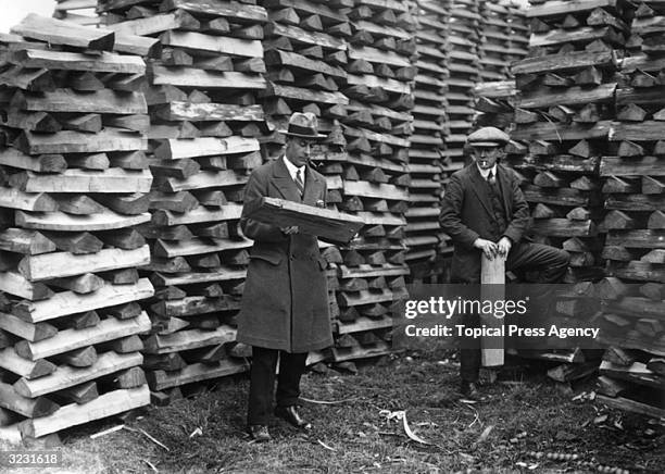 England cricketing legend Jack Hobbs carefully selects the willow from which his bat is to be made.