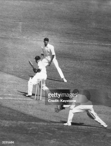 India's opening batsman Pankaj Roy is bowled whilst trying to play, Pakistan's fast bowler Mohammad Khan, to leg, during the Test Match between India...