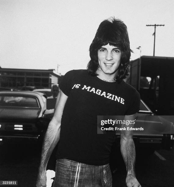 Australian singer and actor Rick Springfield standing in a parking lot as he arrives at a Blindness Prevention telethon. He is wearing a '16...