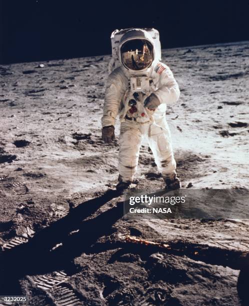 American astronaut Edwin 'Buzz' Aldrin becomes the second man to walk on the moon during the Apollo 11 mission.