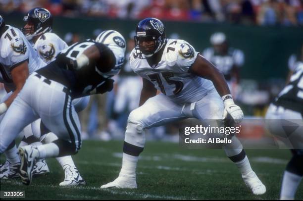 Jonathan Ogden of the Baltimore Ravens sets up to block a member of the New York Jets during a pre-season game at the Meadowlands in East Rutherford,...