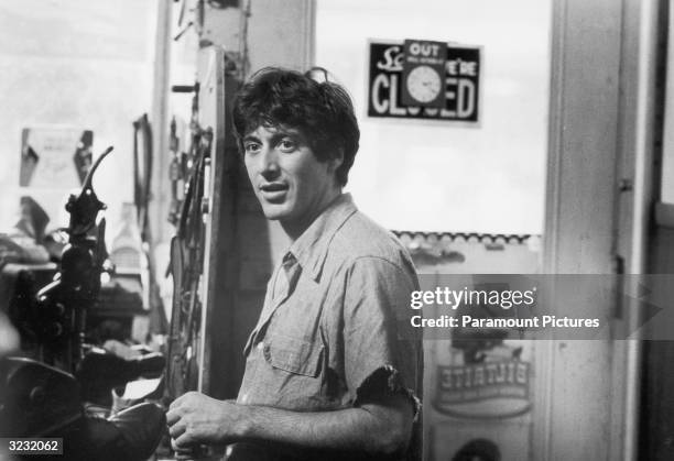 American actor Al Pacino, as New York City policeman Frank Serpico, stands in a room in a still from director Sidney Lumet's film, 'Serpico'. The...