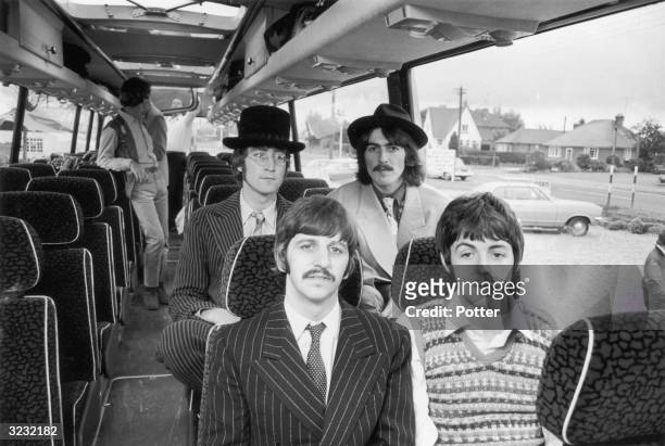 The Beatles travel by coach to the West Country, for some location work on 'The Magical Mystery Tour' film. Clockwise from back left : John Lennon ,...