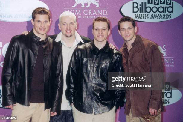 The pop band 98 degrees at the Billboard Music Awards, held at the MGM Grand Hotel and Casino in Las Vegas, Nevada. L-R: Nick Lackey, Justin Jeffre,...
