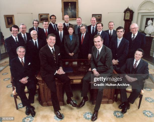 Group portrait of Republican United States President Ronald Reagan with his cabinet members, Washington, DC. Included in the photo are Vice President...