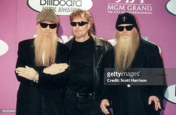 American rock group ZZ Top poses for photographers at the 1999 Billboard Music Awards, held at the MGM Grand Hotel and Casino, Las Vegas, Nevada. The...