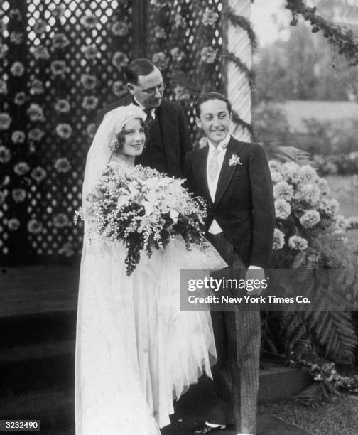 Wedding photo of American film producer Irving Thalberg and actor Norma Shearer , standing with the Rabbi Edgar F Magnin, who performed the ceremony.