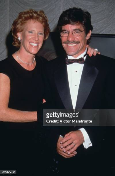 American talk show host Geraldo Rivera standing with his wife, C. C. Dyer, at an unidentified formal event.