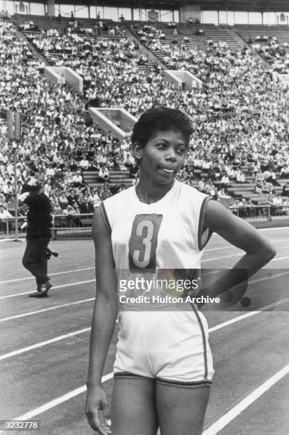 American track athlete Wilma Rudolph, known as the 'black gazelle,' pauses after her record breaking 11.3 second 100m dash at the American - Soviet...
