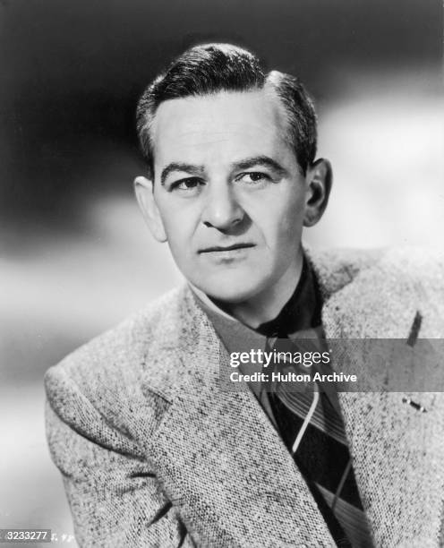 Studio headshot portrait of French-born film director William Wyler.