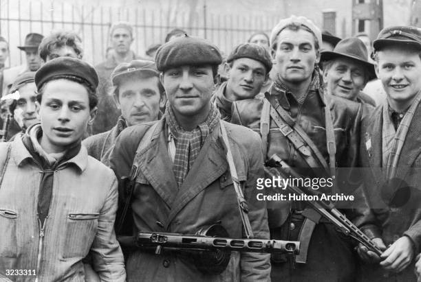 Group of armed young revolutionaries pose during the Hungarian Revolt.