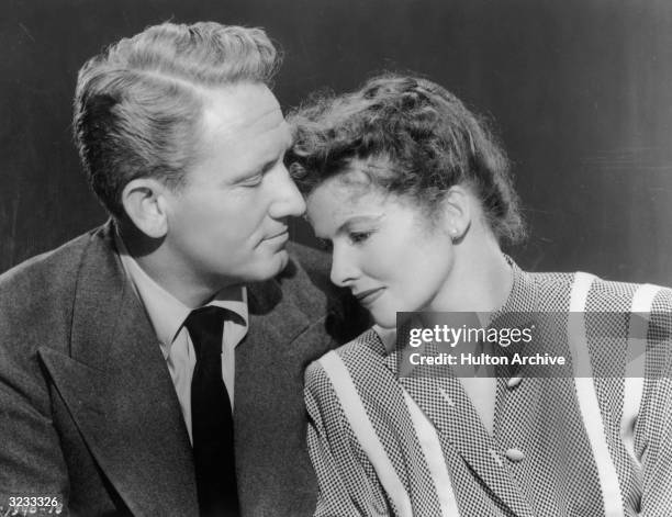 American actors Spencer Tracy and Katharine Hepburn comfort one another in a still from director Harold S Bucquet's film, 'Without Love'.