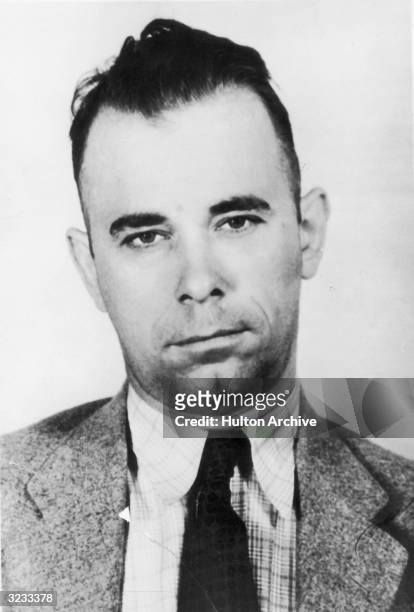 American bank robber John Dillinger , whose exploits throughout the depression hit mid-west earned him the title 'Public Enemy Number One'.