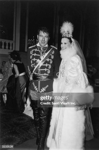 American heriess and designer Gloria Vanderbilt poses with her fourth husband, actor and editor Wyatt Cooper , at the Nine O'clocks Winter Ball in...