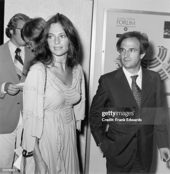 British actor Jacqueline Bisset and her boyfriend, French director Francois Truffaut, stand in the lobby of the Mark Taper Forum Theater at the...