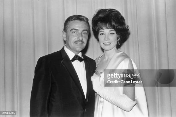 American actor Shirley MacLaine poses with her husband, producer Steve Parker, backstage at the Academy Awards, Santa Monica, California. MacLaine...
