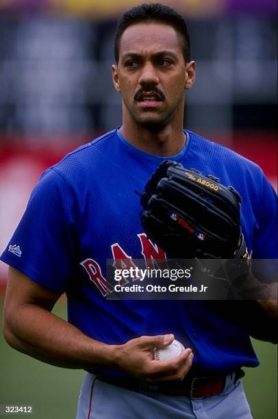 Outfielder Juan Gonzalez of the Texas Rangers in action during a game against the Oakland Athletics at the Oakland Coliseum in Oakland, California....