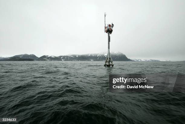 Pylon marks the location of the Exxon Valdez shipwreck on Bligh Reef on April 6, 2004 near Valdez, Alaska. Fifteen years after the Exxon Valdez...