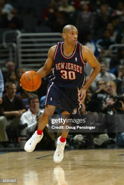 Kerry Kittles of the New Jersey Nets drives against the Washington Wizards during the game at the MCI Center on March 31, 2004 in Washington, DC. The...