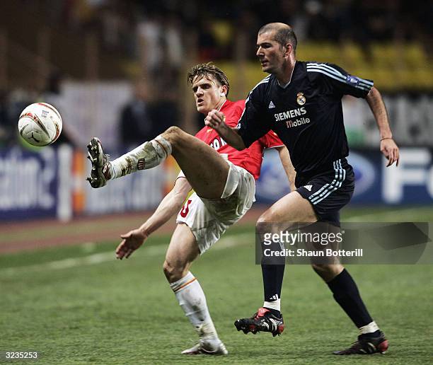 Zinedine Zidane of Real Madrid challenges Jerome Rothen of Monaco during the final whistle of the UEFA Champions League Quarter Final Second Leg...