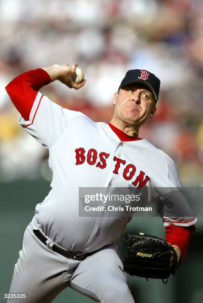 Curt Schilling of the Boston Red Sox pitches his first game as a Red Sox player against the Baltimore Orioles on April 6, 2004 at Camden Yards in...