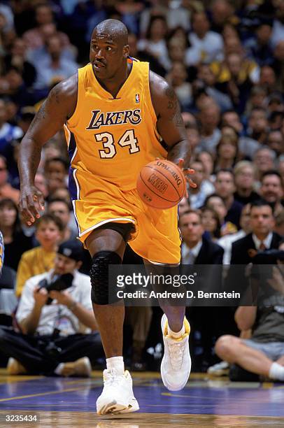 Shaquille O'Neal of the Los Angeles Lakers pushes the ball upcourt during the game against the New Orleans Hornets at Staples Center on March 30,...