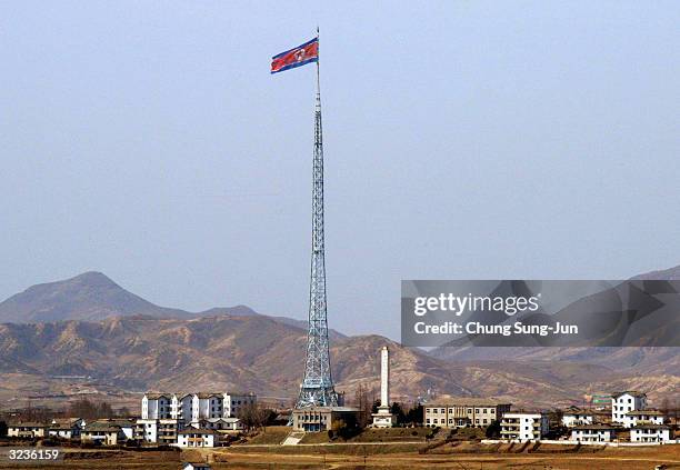 North Korean national flag in North Korea's propaganda village of Gijungdong is seen from an observation post on April 7, 2004 in the Demilitarized...