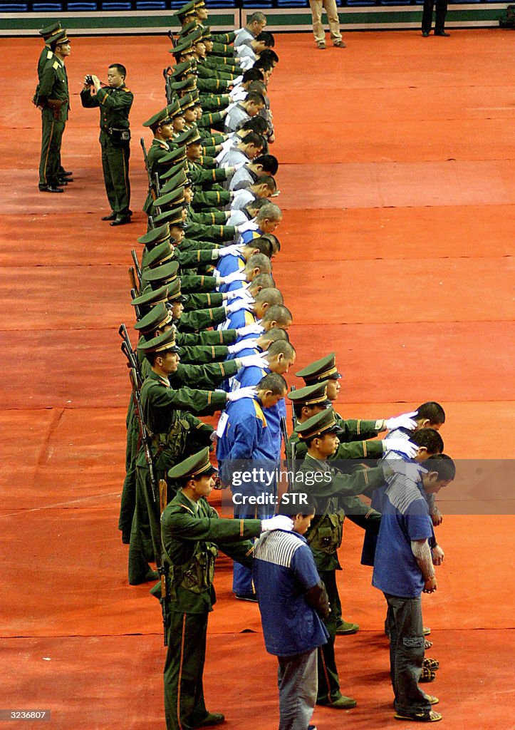 CHINA OUT Chinese police show of a group