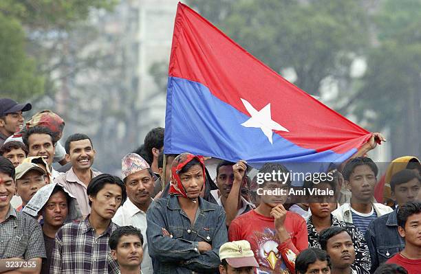 Nepalese activists stage protests against King Gyanendra during a national strike called by Maoist rebels that brought the Himalayan kingdom to a...