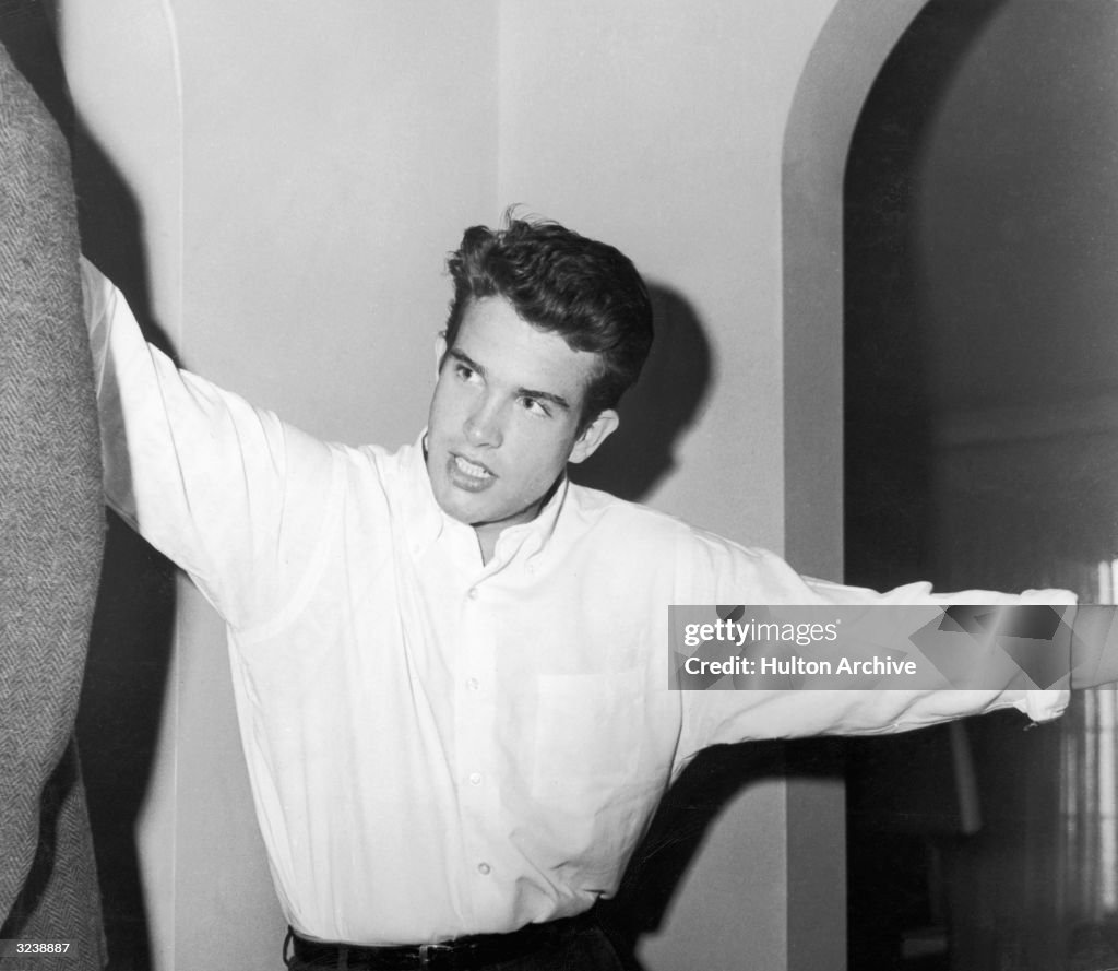 Warren Beatty Ripped American actor Warren Beatty wears a white button-down shirt in his ...