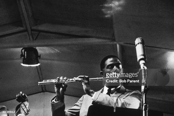 American jazz musician Eric Dolphy playing the flute at the Newport Jazz Festival, Newport, Rhode Island.