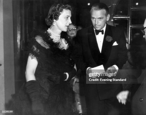 American actor Douglas Fairbanks Jr at the Coliseum Theatre with the Duchess of Kent to see 'Mr Roberts'.