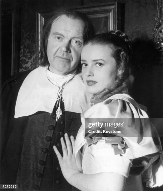 Actress Jeanne Moreau with Fernand Ledoux in a production of 'Tartuffe' performed to mark the anniversary of Moliere's death.
