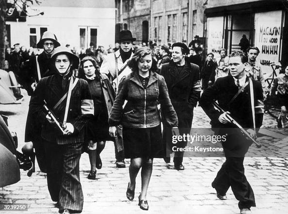 Danish Rage Members of the Danish resistance movement escorting two women... News ...