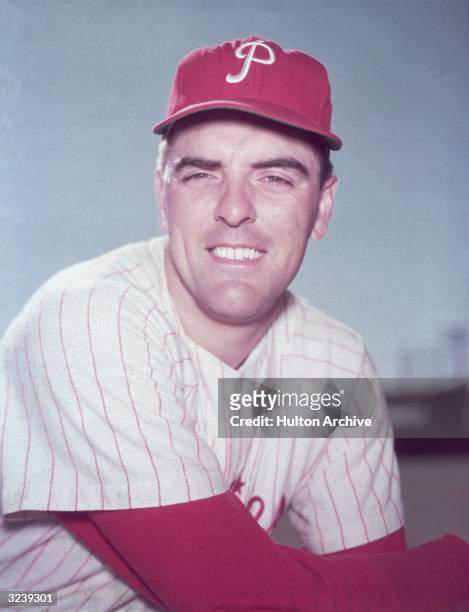 Heashot portrait of baseball pitcher Curt Simmons wearing his Philadelphia Phillies uniform and smiling.