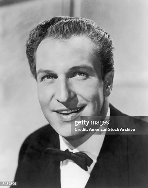 Studio headshot of American actor Vincent Price wearing a tuxedo.