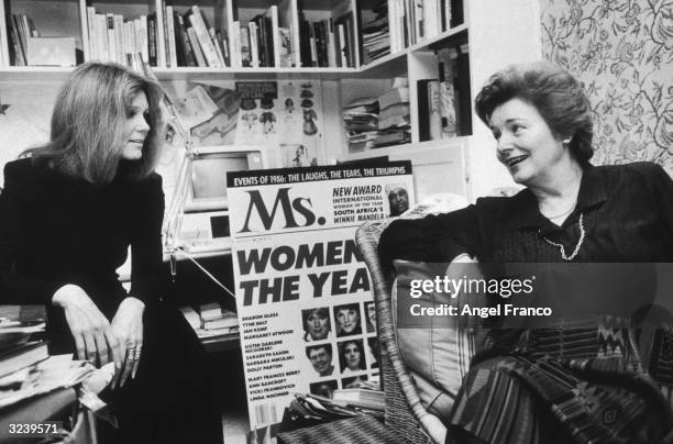 American feminist activists and writers Gloria Steinem and Patricia Carbine, cofounders of Ms. Magazine, talking in an office. The pair were seeking...