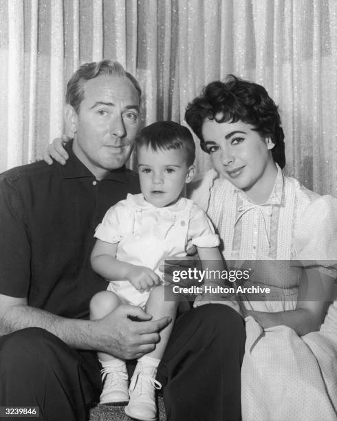 Actors Elizabeth Taylor and Michael Wilding with their son, Michael Jr, Los Angeles, California, 1955.