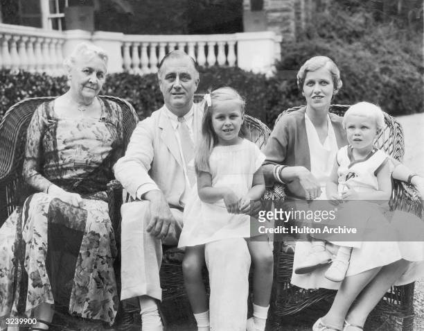 Group portrait of New York State Governor Franklin Delano Roosevelt with his mother, Sara , his granddaughter, Ann Roosevelt Dall , his daughter,...