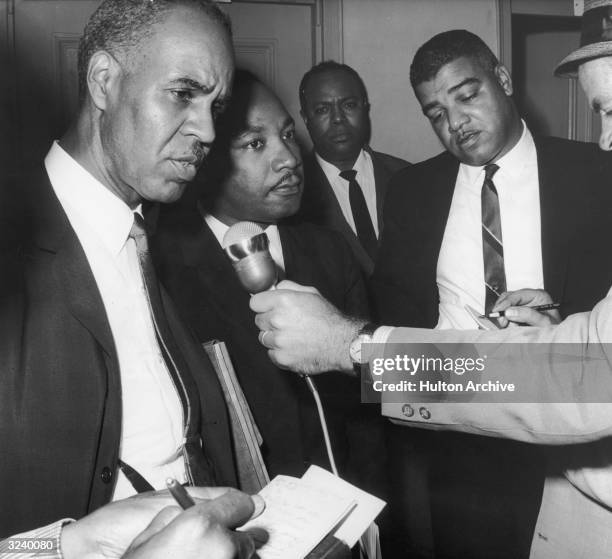 Executive secretary Roy Wilkins , Reverend Dr Martin Luther King Jr , National Urban League director Whitney Young , and CORE founder James Farmer...