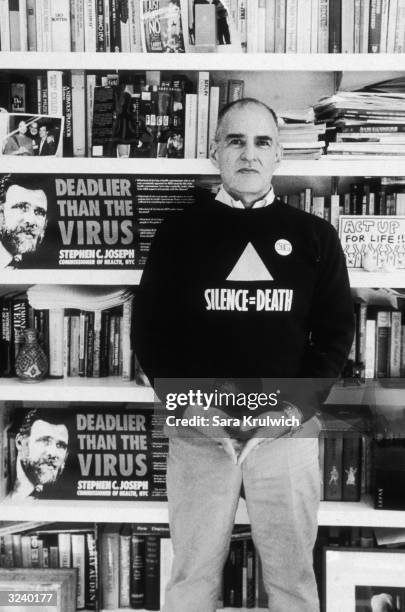 Portrait of American author, AIDS campaigner and gay rights activist Larry Kramer, founder of ACT-UP and the Gay Men's Health Crisis group, posing in...