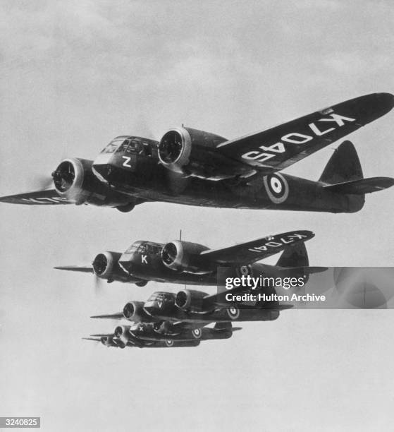Flight of Bristol Blenheim Mkl light bombers led by K7045:114-Z from No 114 Squadron of 2 Group, Royal Air Force Bomber Command in line astern...