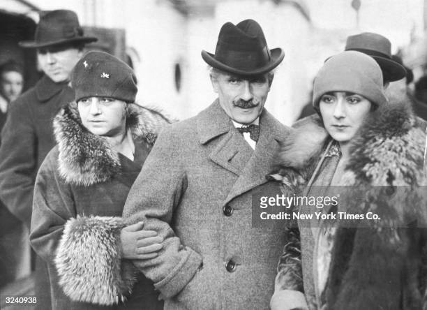 Italian conductor Arturo Toscanini with his wife, and daughter Wanda, right, who married the pianist Vladimir Horowitz in December 1933. Both women...