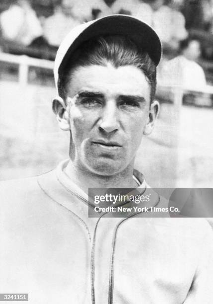 Headshot of baseball player Carl Hubbell , pitcher for the New York Giants, in his uniform and cap.